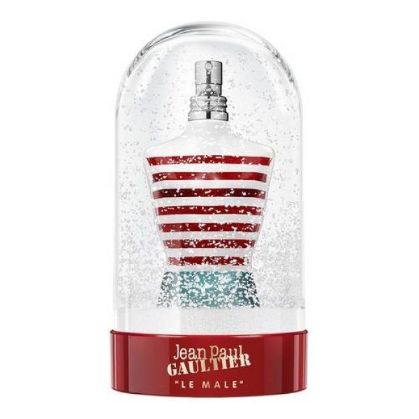 Jean Paul Gaultiuer signs a snow globe for his Le Male perfume